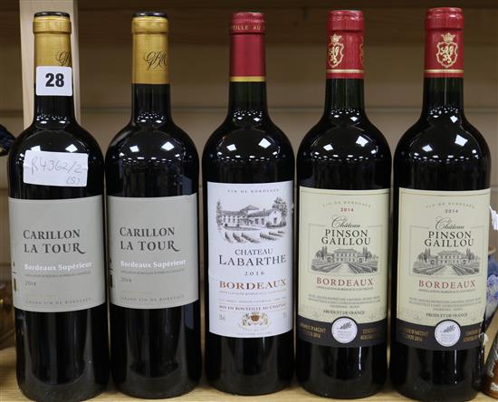 Five assorted bottles of Bordeaux wine